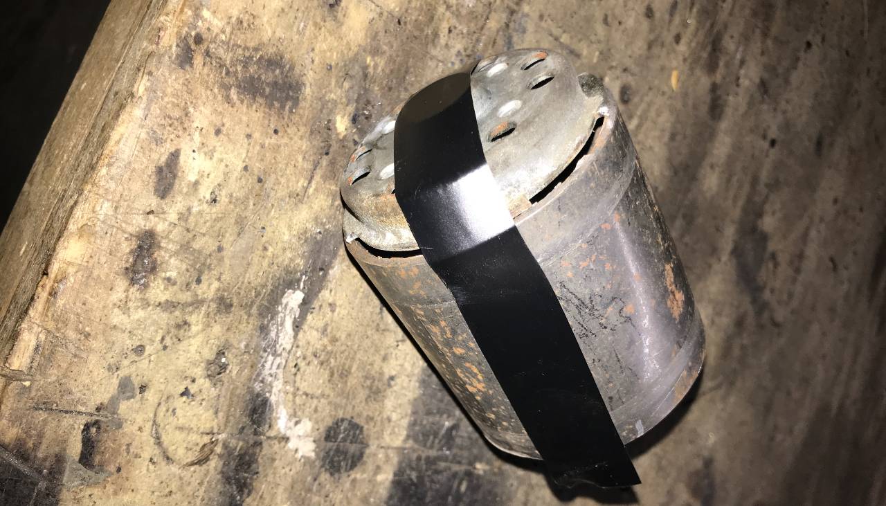 End cap and exhaust pipe taped together