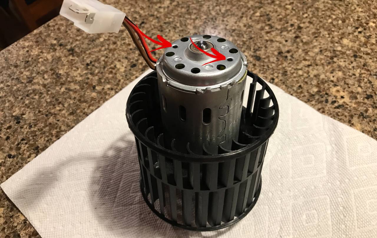Small holes on back of motor