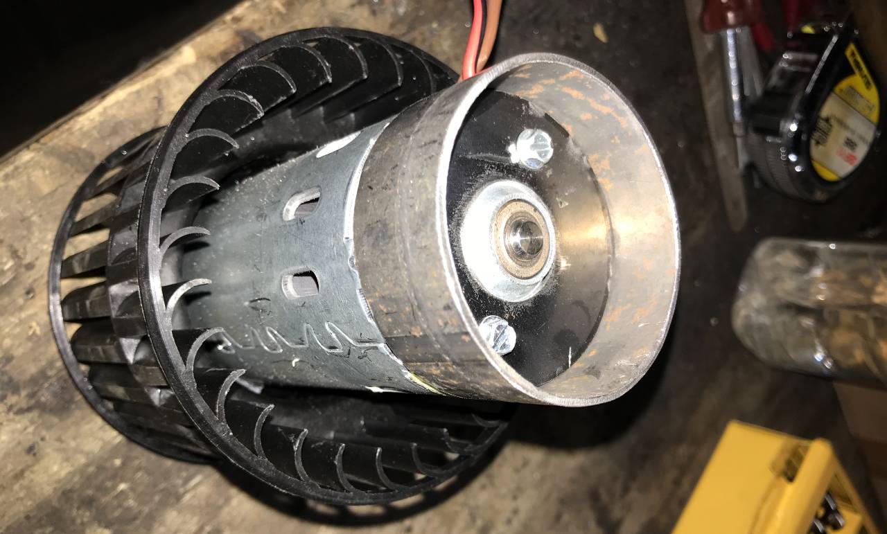 Pipe slid over back of motor